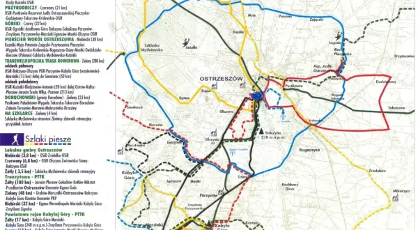 Mapa pokazuje trasy rowerowe i piesze wokół Ostrzeszowa, w tym szlaki oznaczane kolorami i nazwami, np. "trasy rowerowe karpacz" nie występują na mapie.