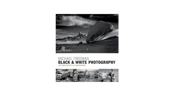Michael Freeman's "Black & White Photography" showcases the timeless art of monochrome. This cover features a dramatic desert landscape and smaller images of buses, giraffes, and people.