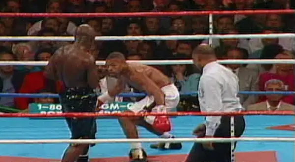 Roy Jones Jr. in the ring, a moment from what many consider his best fight. The crowd watches intently as he faces his opponent.