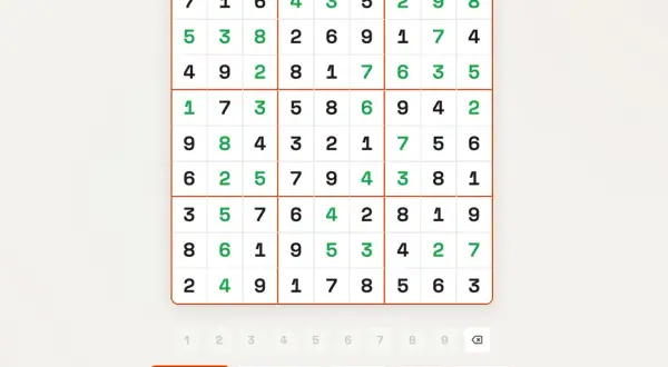 Rozwiązujesz zagadkę z liczbami od 1 do 9. Plansza Sudoku wypełniona jest cyframi, niektóre z nich są zielone.