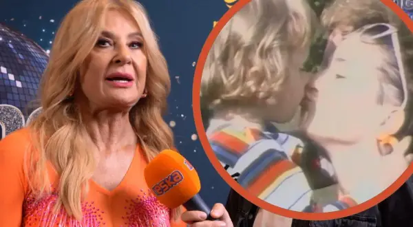 Majka Jeżowska w pomarańczowej kreacji, w tle zdjęcie z dzieciństwa, gdzie całuje syna. Piosenkarka wspomina: "A ja wolę moją mamę".