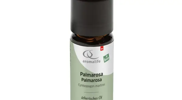Kleine Flasche ätherisches Palmarosa Öl. Die **Palmarosa Wirkung Psyche** wird durch den Duft positiv beeinflusst.