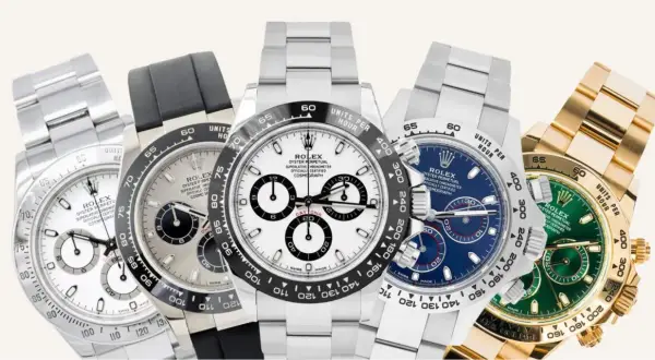 Cinque orologi Rolex Daytona, icone di stile e precisione, in diverse varianti di quadrante e metallo.