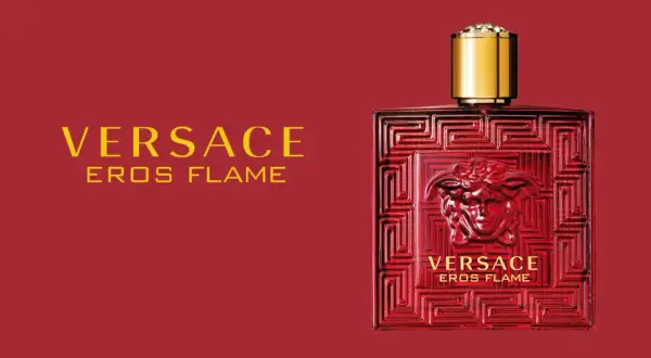Flakon Versace Eros Flame 100ml w intensywnym czerwonym kolorze z greckim wzorem i złotą nakrętką.