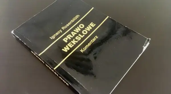 Czarna okładka książki "Prawo wekslowe" Ignacego Rosenblütha, z widocznymi śladami użytkowania.