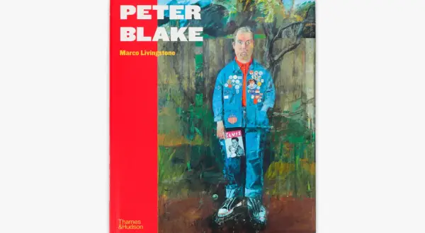 Book cover featuring a painting of Peter Blake in a denim jacket adorned with badges, holding an Elvis Presley magazine.