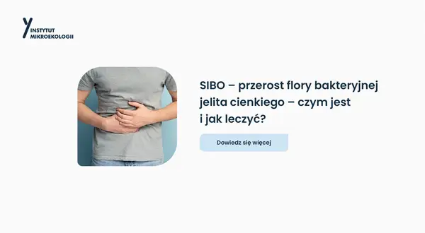Osoba trzyma się za brzuch, symbolizując problemy z jelitami. Dowiedz się, **sibo co to** jest i jak sobie z tym radzić.