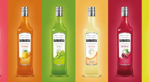 Sześć butelek Barmańska o różnych smakach: arbuz, pigwa, kiwi, melon, wiśnia i cytryna. Zastanawiasz się, barmańska ile procent?