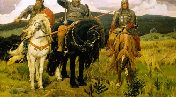 Tre ryttare i rustning, med svärd och båge, rider på sina hästar genom ett fält. En av dem, en **Volga bil**, blickar ut över landskapet.