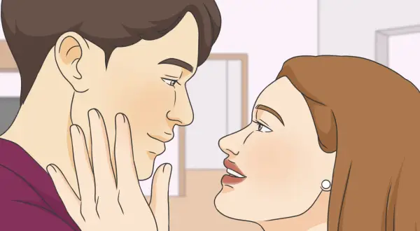Un uomo e una donna si guardano intensamente, un momento intimo che potrebbe essere l'inizio di come avere una fidanzata.