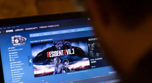 Ekran komputera z otwartą platformą Steam, widoczna okładka gry Resident Evil 3.