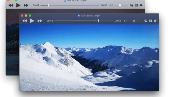 Two iina windows display a snowy mountain landscape. The front window shows a movie player with a ski resort scene.