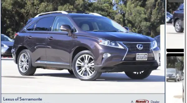 Mörkbrun Lexus RX 450h parkerad utomhus. En potentiell lexus rx 450h problem kan vara relaterad till dess hybridkomponenter.