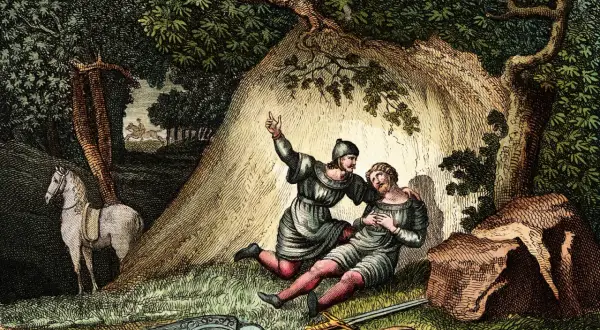 Rycerz pociesza rannego towarzysza. Scena nawiązuje do epoki "Pieśni o Rolandzie", z widocznym koniem i bronią.