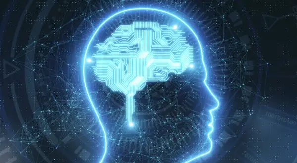 Silhouette bleue d'une tête avec un cerveau en circuit imprimé, symbolisant l'entrainement mémoire et la connexion neuronale.