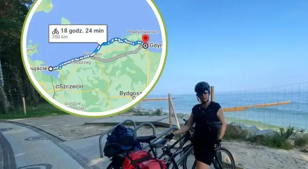 Kobieta z rowerem nad morzem, planująca trasę z Kołobrzegu do Gdyni. Rozkład jazdy pokazuje 350 km.