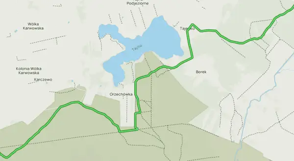 Mapa szlaków pieszych w Puszczy Bolimowskiej, prowadząca przez tereny leśne, w pobliżu jeziora Tajno i miejscowości takich jak Wólka Karwowska, Orzechówka i Borek.