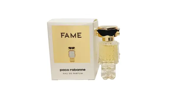 Paco Rabanne Fame – flakonik perfum i pudełko z motywem ikonicznej postaci w okularach przeciwsłonecznych.