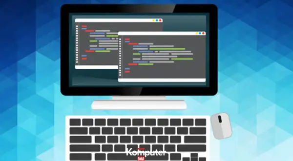 Monitor z kodem, klawiatura i myszka – to narzędzia do tworzenia w aplikacjach do programowania.