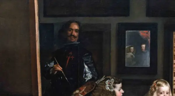 A painter, brush in hand, stands before a canvas, surrounded by royalty. This famous art from the Baroque period captures a moment of creation.