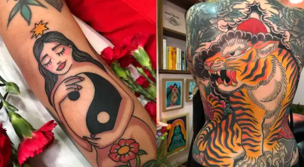 Tatuaje de una mujer con símbolo yin-yang y un tigre rugiendo en la espalda, estilo Diana Deets.