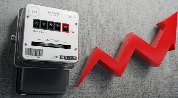Licznik energii elektrycznej i czerwona strzałka w górę symbolizują wzrost cen prądu.
