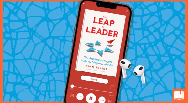 En mobiltelefon visar en ljudbok om ledarskap, "The Leap to Leader". Kanske kan den hjälpa till att motverka dålig arbetsmoral.
