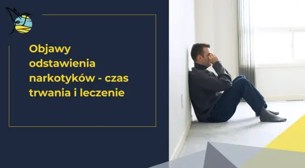 Mężczyzna siedzi przy ścianie, z rękami na twarzy, przeżywając trudne chwile związane z syndromem odstawienia narkotyków.