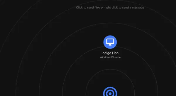 Interfejs airdrop. Widoczny komputer "Indigo Lion" i ikona sieci. Możliwość wysyłania plików lub wiadomości.