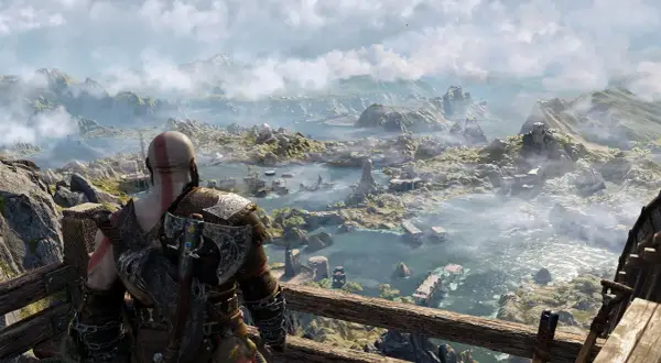 Kratos spogląda na rozległy krajobraz, zastanawiając się, ile godzin zajmie mu odkrycie wszystkich tajemnic tego świata w God of War.