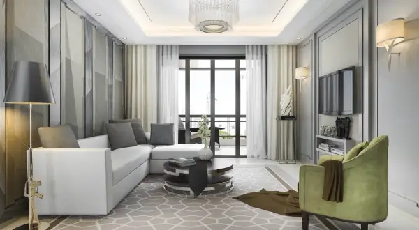 Nowoczesny salon z białym narożnikiem, zielonym fotelem i geometryczną tapetą. Czy sufit podwieszany w salonie o wysokości 250 cm to dobry pomysł? Tak, dodaje elegancji.