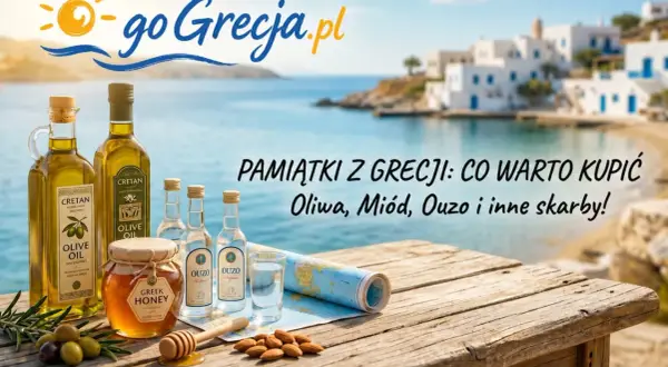 Oliwa, miód, ouzo – co przywieźć z Grecji? Pamiątki z wakacji na drewnianym stole z widokiem na grecką wyspę.