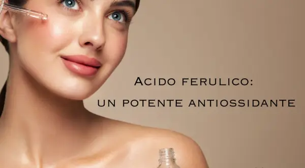 Donna con contagocce che applica un siero viso all'acido ferulico, un potente antiossidante per la pelle.