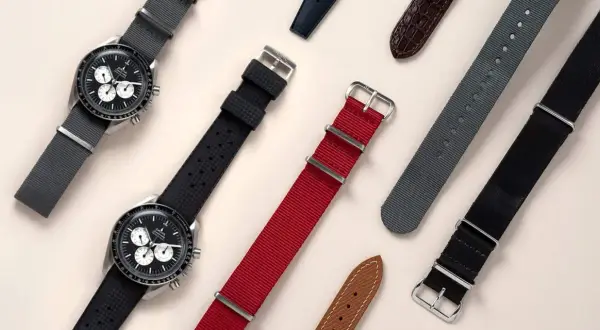 Variedad de tipos correa reloj: gris, negro de caucho, rojo, gris de nylon, negro de nylon y marrón de piel.