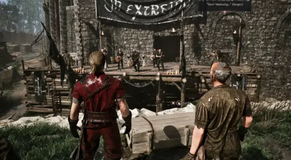 Gothic 1 Remake: Eine Band spielt auf einer Bühne vor einer Burg. Zwei Männer beobachten die Szene.
