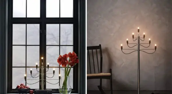 Två adventsljusstake inspirationer: en i ett mörkt fönster med amaryllis och äpplen, en annan som golvlampa bredvid en gungstol.