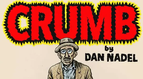 The word "CRUMB" in bold red letters with a jagged yellow and black outline. Below it, a portrait of a man with glasses and a hat, and the text "by DAN NADEL". This is a piece of art.