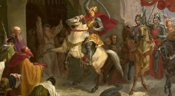 Rycerz na koniu z mieczem wzniesionym ku górze, tłum wiwatujący. Czy żyją potomkowie polskich królów?