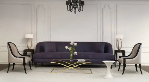 Elegancka sofa i fotele tworzą przytulną przestrzeń w klasycznych wnętrzach.
