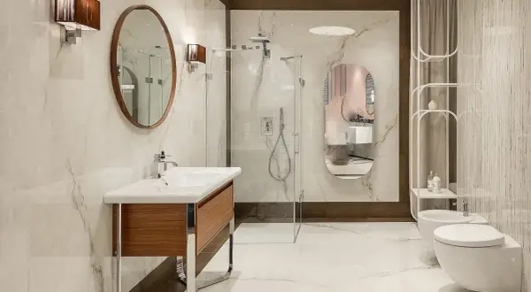 Elegancka łazienka z umywalką, prysznicem i bidetem. Bidet do czego służy? Do higieny intymnej, zapewniając świeżość.