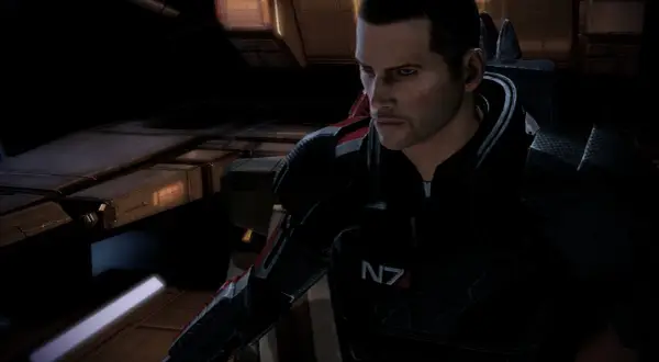 Komandor Shepard w zbroi N7, gotowy do akcji. Ten **Mass Effect 2 poradnik** pomoże Ci przetrwać!