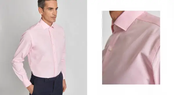 Uomo con camicia rosa e cravatta abbinata, un look elegante e raffinato.