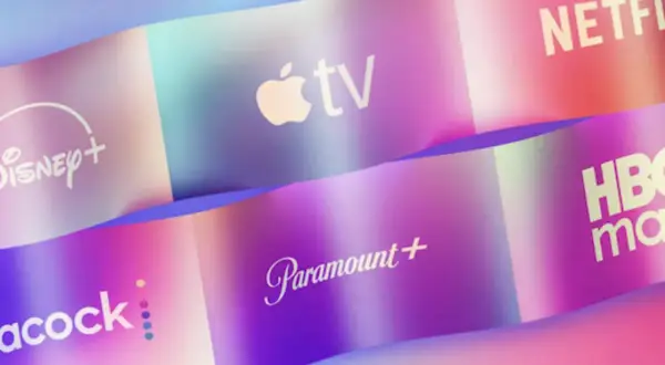 Logos of streaming services like Disney+, Apple TV, Netflix, Peacock, Paramount+, and HBO Max are displayed on colorful, wavy ribbons, showcasing the variety of what is online video.