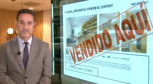 Hombre en traje habla sobre cuántas viviendas hay en España. En pantalla, anuncio de piso "VENDIDO AQUÍ".