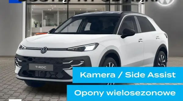 Nowy T-Roc z kamerą i asystentem parkowania, dostępny od ręki. Idealny na każdą pogodę dzięki oponom wielosezonowym.