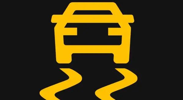 Voyant ESP allumé sur le tableau de bord, signalant une perte d'adhérence de la voiture.
