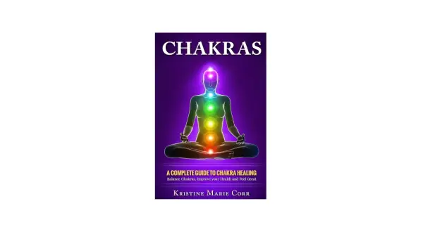 Okładka książki "Chakras" z sylwetką w pozie medytacyjnej i kolorowymi czakrami.