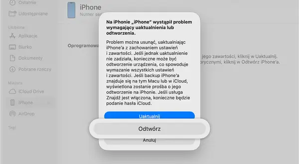 Komunikat o błędzie na iPhonie, sugerujący uaktualnienie lub odtworzenie. Możliwe rozwiązanie problemu to reset iPhone'a.