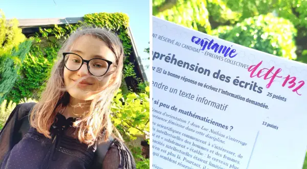 Uśmiechnięta dziewczyna w okularach na tle zieleni, trzyma w ręku test z języka francuskiego, poziom delf B2.