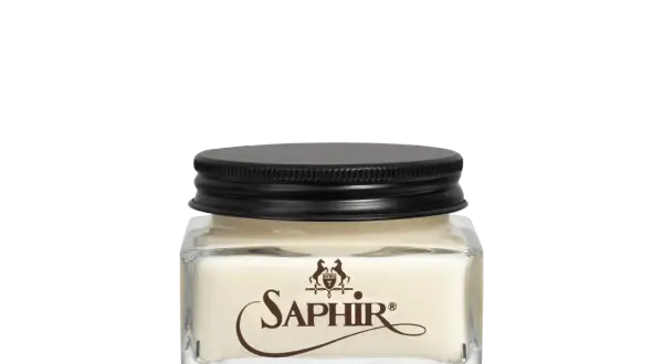 Crème pour le cuir napa Saphir dans un pot en verre avec un couvercle noir.